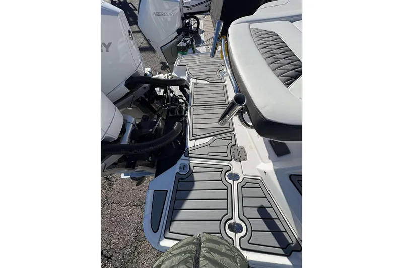 Slide: The Image of 2020 Monterey 305SS Super Sport boat deck with seating and Mercury engines. - 30