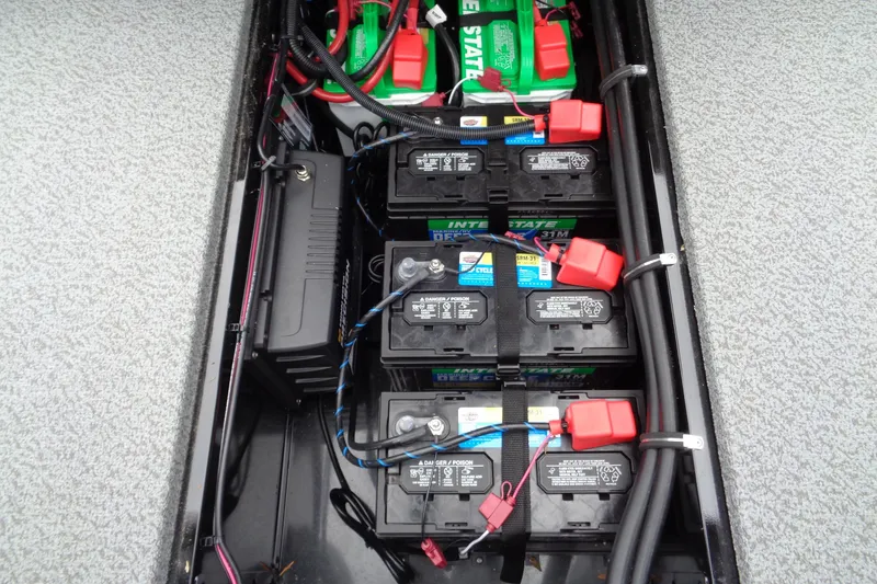Slide: The Image of Battery compartment of 2026 Lund 2175 Pro-V boat with multiple Interstate batteries. - 30