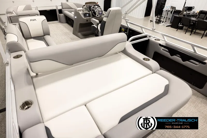 Slide: The Image of Luxurious 2026 Avalon VEN85 VRB pontoon boat interior with plush seating and modern helm. - 11