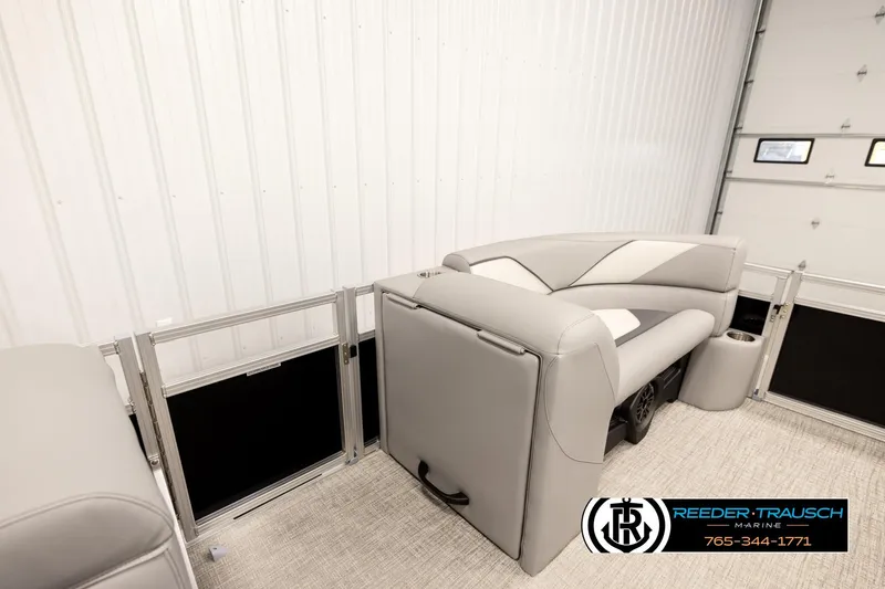 Slide: The Image of 2026 Avalon VEN85 VRB pontoon boat interior with gray seating and cup holder. - 20