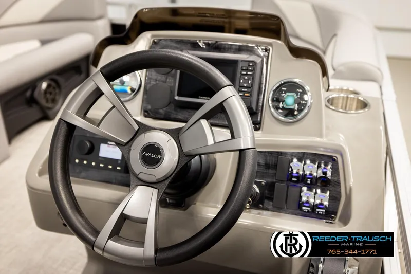 Slide: The Image of Steering console of 2026 Avalon VEN85 VRB boat with modern controls and branding. - 33