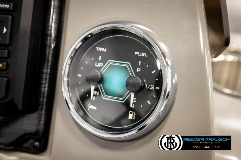 Slide: The Image of Close-up of Avalon VEN85 VRB 2026 fuel and trim gauge on a boat dashboard. - 39