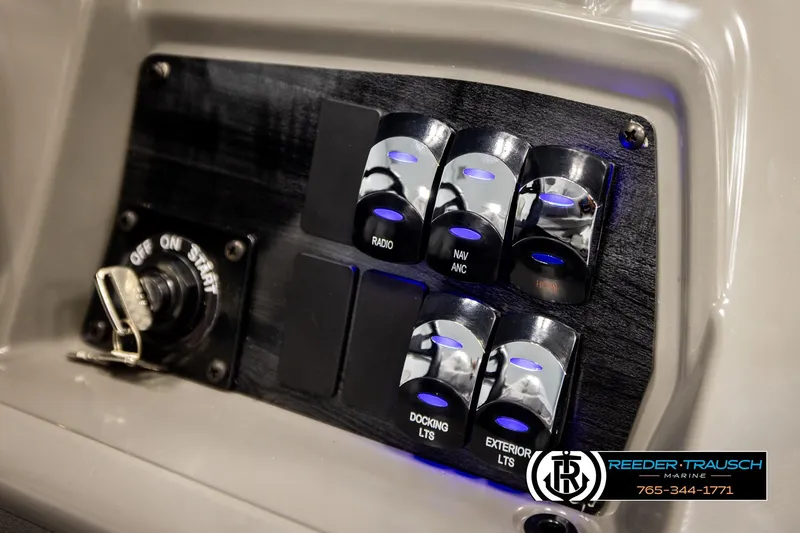 Slide: The Image of Control panel of 2026 Avalon VEN85 VRB boat with labeled switches and ignition key. - 40