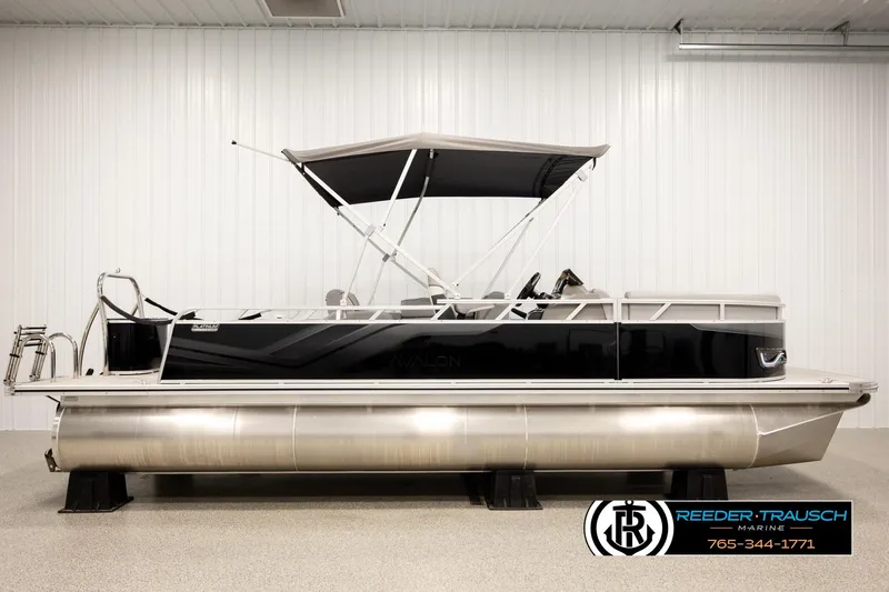 Slide: The Image of 2026 Avalon VEN85 VRB pontoon boat with canopy in showroom setting. - 5