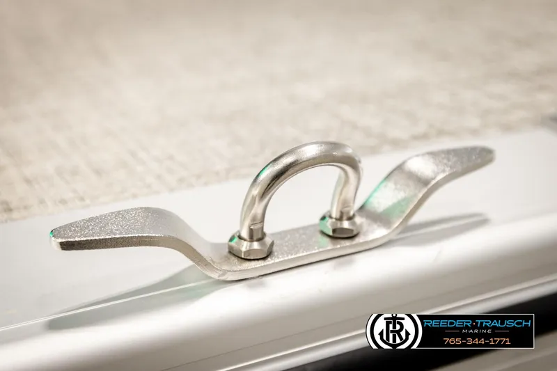 Slide: The Image of Close-up of a 2026 Avalon VEN85 VRB boat cleat, featuring Reeder-Trausch Marine branding. - 54