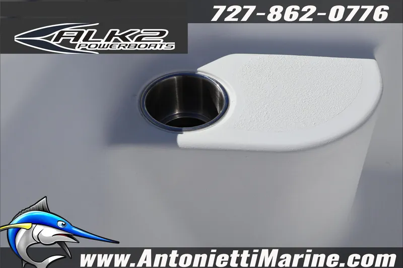 Slide: The Image of 2026 ALK2 Powerboats 17HS cup holder detail with contact information and logo. - 16