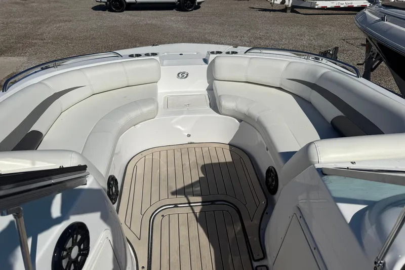 Slide: The Image of 2022 Hurricane SunDeck 187 IO boat interior with spacious seating and sleek design. - 15