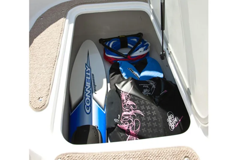 Slide: The Image of Manufacturer Provided Image: Storage compartment of 2022 Hurricane SunDeck 187 IO with water sports gear. - 3