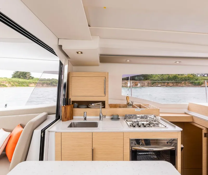 Slide: The Image of Modern kitchen interior of 2025 Fountaine Pajot NEW 41 yacht with ocean view. - 8