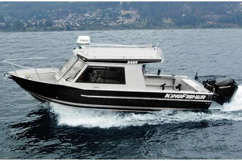 The Image of 2026 KingFisher 2425 Escape HT boat on trailer in indoor showroom. - 0