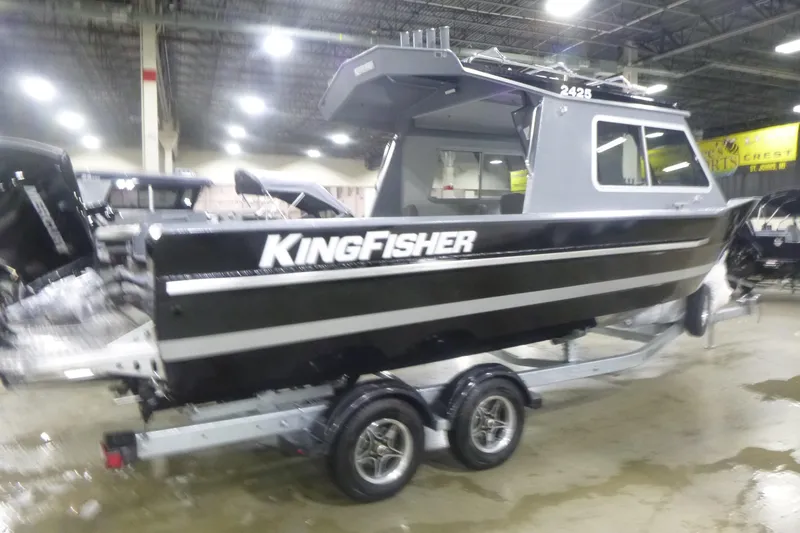 Slide: The Image of Control panel in a 2026 KingFisher 2425 Escape HT boat interior. - 12