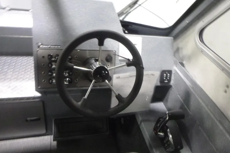 Slide: The Image of Interior storage compartment of 2026 KingFisher 2425 Escape HT boat. - 18