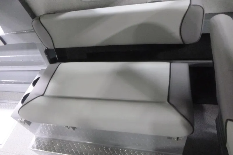 Slide: The Image of Interior view of 2026 KingFisher 2425 Escape HT boat, featuring storage compartments. - 21