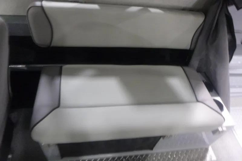 Slide: The Image of Interior detail of 2026 KingFisher 2425 Escape HT boat, featuring a gray step. - 23