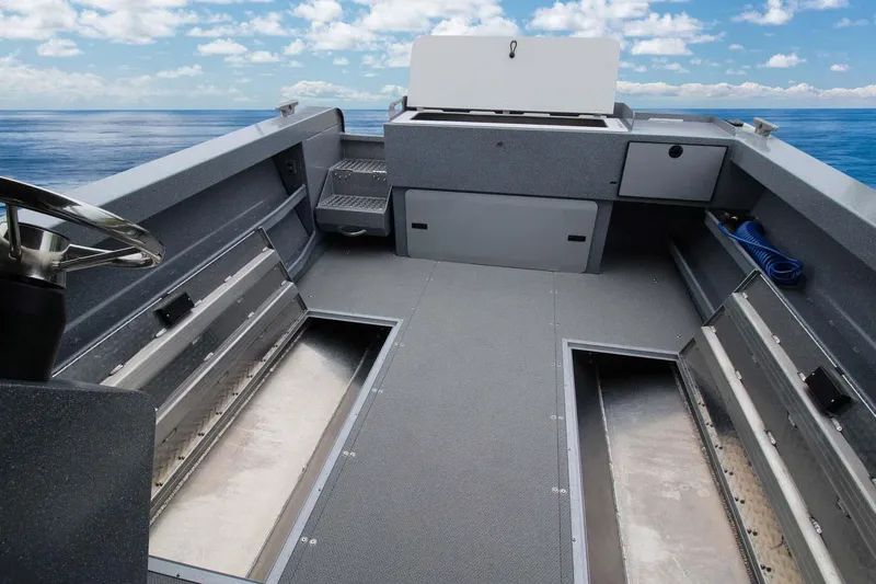 Slide: The Image of Interior of 2026 KingFisher 2425 Escape HT boat, featuring seating and storage. - 5