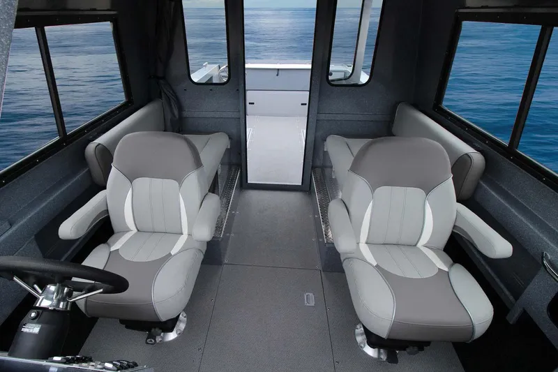 Slide: The Image of Interior of 2026 KingFisher 2425 Escape HT boat, featuring spacious seating and storage. - 6