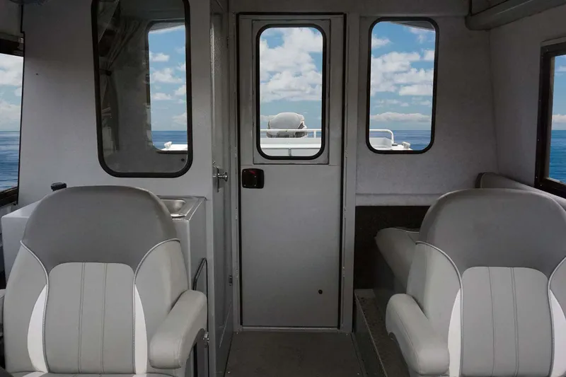 Slide: The Image of 2026 KingFisher 2425 Escape HT boat interior, showcasing spacious, durable deck design. - 7
