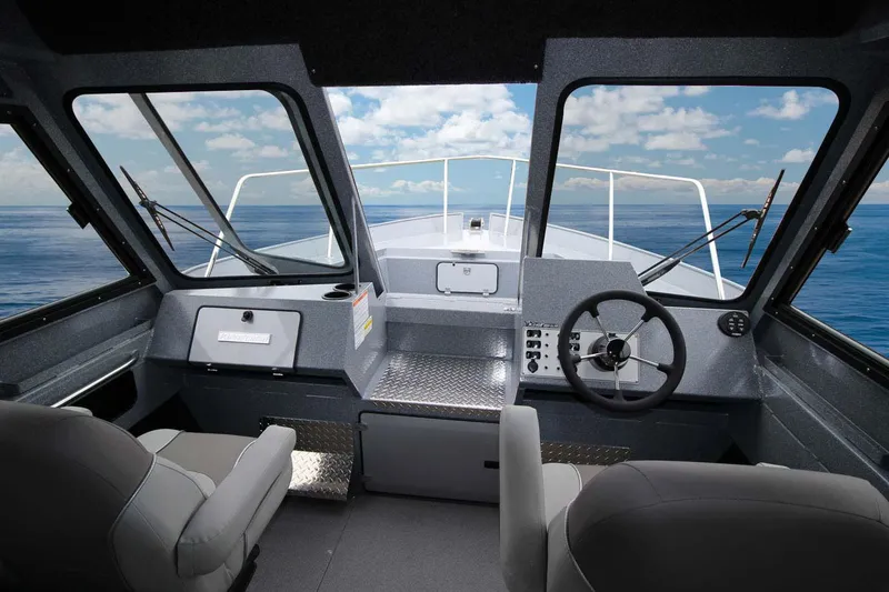 Slide: The Image of Diamond plate step in 2026 KingFisher 2425 Escape HT boat interior. - 8