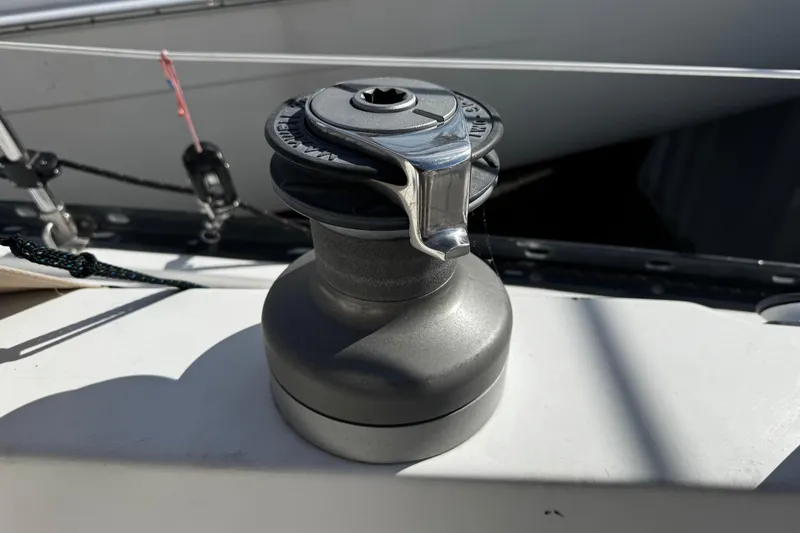 Slide: The Image of Winch on 1984 Hunter 37 Cutter sailboat deck, used for sail handling. - 11