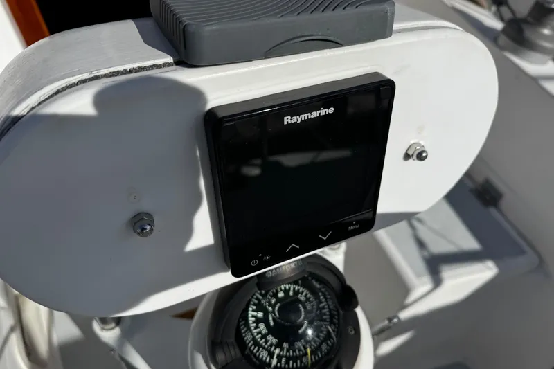Slide: The Image of Raymarine navigation system and compass on 1984 Hunter 37 Cutter sailboat. - 13