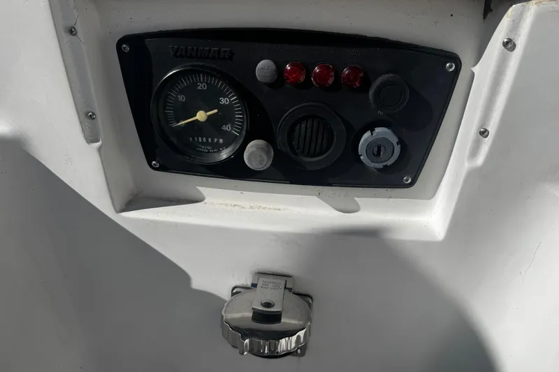 Slide: The Image of Control panel of a 1984 Hunter 37 Cutter sailboat with Yanmar engine gauge. - 12