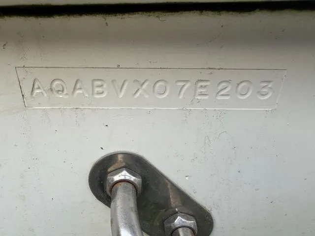 Slide: The Image of Hull identification number on 2003 Aquasport Osprey 205 boat. - 15