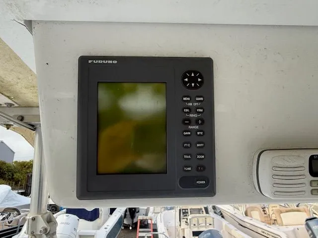 Slide: The Image of Furuno marine display on 2003 Aquasport Osprey 205 boat dashboard. - 7