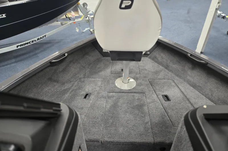Slide: The Image of 2026 Princecraft Sport 185 boat interior with gray carpet and swivel seat. - 6