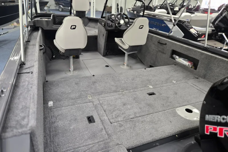 Slide: The Image of 2026 Princecraft Sport 185 boat interior with seating and carpeted flooring. - 8