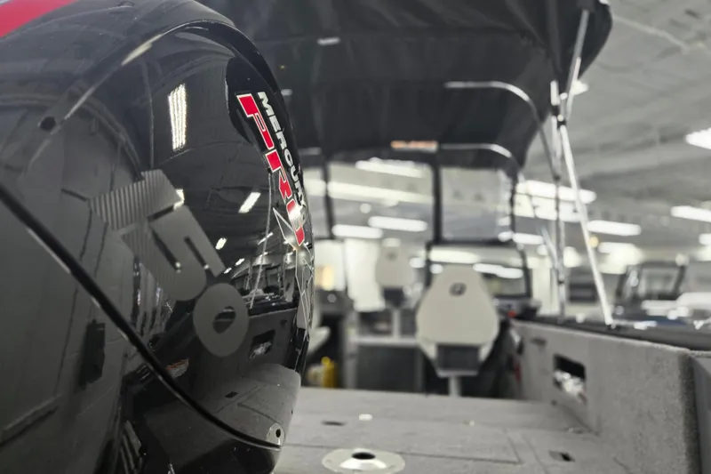 Slide: The Image of 2026 Princecraft Sport 185 boat with Mercury Pro 150 engine in showroom. - 9