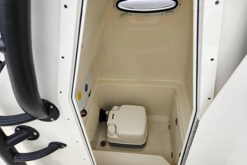 Slide: The Image of Interior of 2026 Pathfinder 2400 Open boat with compact toilet. - 12