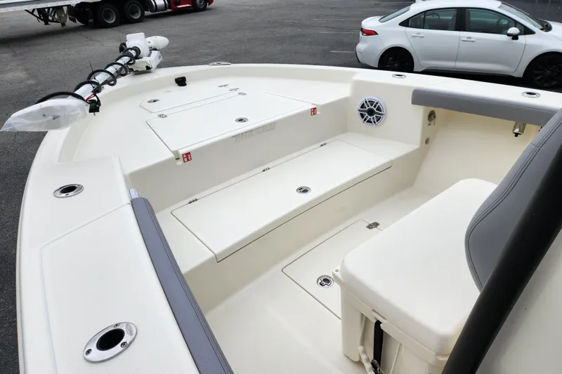 Slide: The Image of 2026 Pathfinder 2400 Open boat interior with seating and storage compartments. - 8