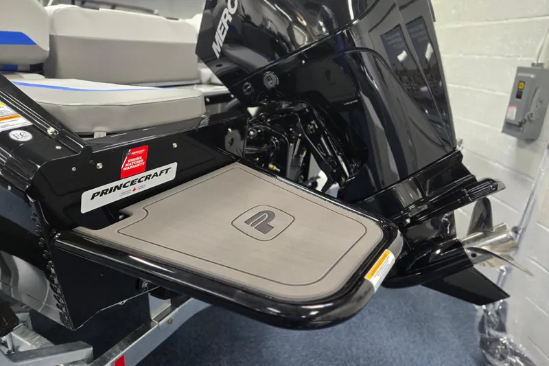 Slide: The Image of 2026 Princecraft Sport 188 boat with Mercury engine, featuring sleek design and comfortable seating. - 12