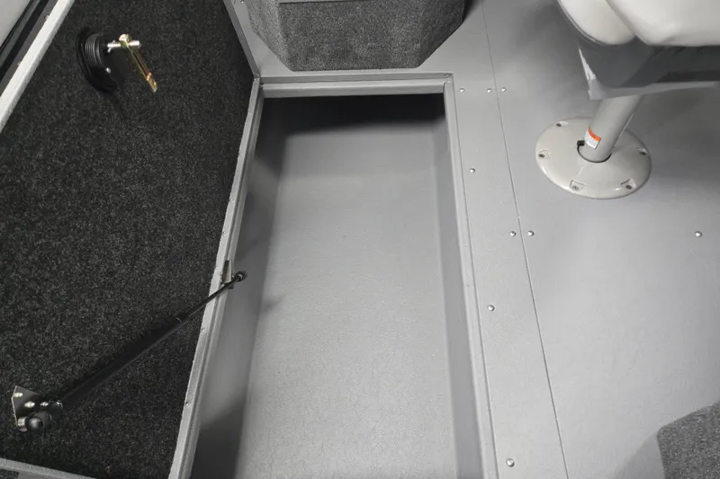 Slide: The Image of Interior view of 2026 Princecraft Sport 188 boat, featuring storage compartment and seat base. - 15