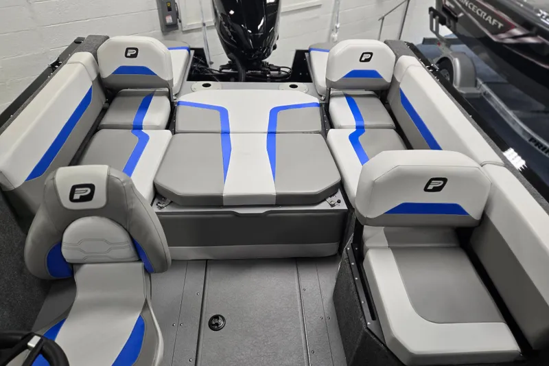 Slide: The Image of 2026 Princecraft Sport 188 boat interior with gray and blue seating arrangement. - 5