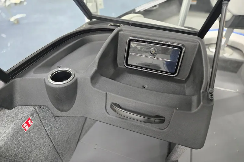 Slide: The Image of 2026 Princecraft Sport 188 boat dashboard with cup holder and storage compartment. - 9
