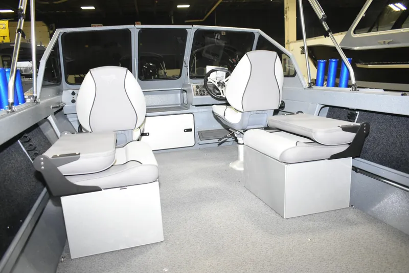 Slide: The Image of Interior of 2026 KingFisher 1825 Falcon boat with modern seating and controls. - 19
