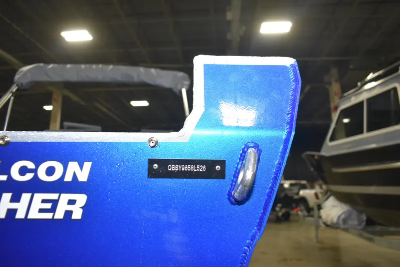 Slide: The Image of 2026 KingFisher 1825 Falcon boat detail in indoor showroom. - 29