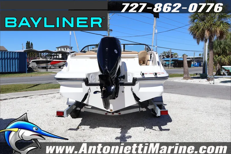 Slide: The Image of 2026 Bayliner V20 boat displayed at Antonietti Marine dealership. - 2