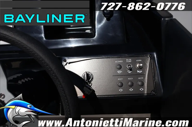 Slide: The Image of Dashboard of 2026 Bayliner V20 boat with control panel and logo. - 21
