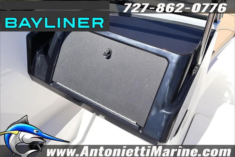 Slide: The Image of Bayliner V20 2026 boat dashboard with storage compartment, Antonietti Marine branding. - 23
