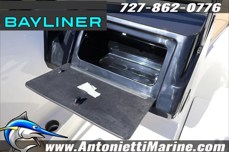 Slide: The Image of 2026 Bayliner V20 storage compartment with open hatch, featuring Antonietti Marine branding. - 24