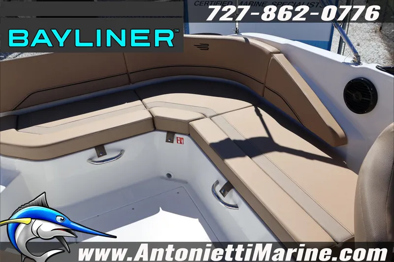 Slide: The Image of 2026 Bayliner V20 boat interior with tan seating, showcased by Antonietti Marine. - 25