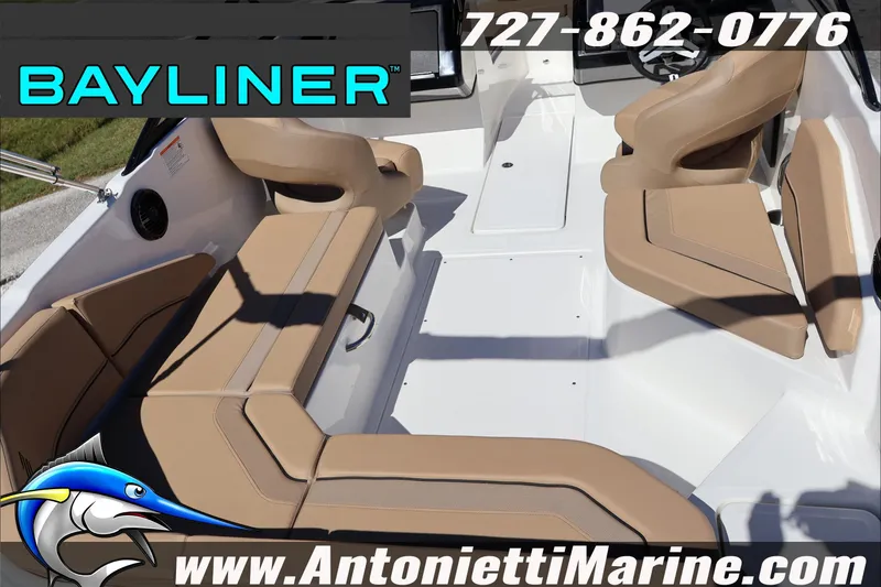Slide: The Image of Interior view of 2026 Bayliner V20 boat with tan seating, featuring Antonietti Marine branding. - 8