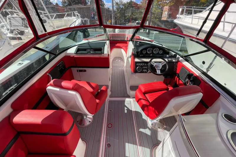 Slide: The Image of Interior of 2014 Sea Ray 270 SLX boat with red and white seating. - 14