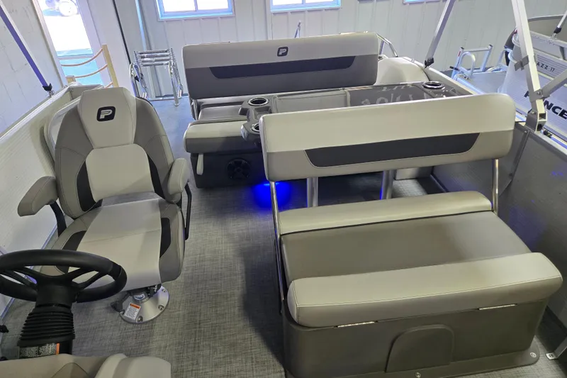 Slide: The Image of 2025 Princecraft Vectra 21 RL interior with modern seating and steering wheel. - 7