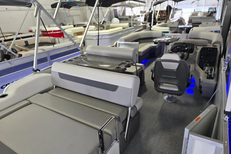 Slide: The Image of 2025 Princecraft Vectra 21 RL pontoon boat interior with modern seating and blue LED lighting. - 9