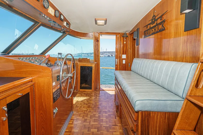 Slide: The Image of Interior of 1979 Hatteras 58 Motor Yacht with wooden helm and seating. - 41