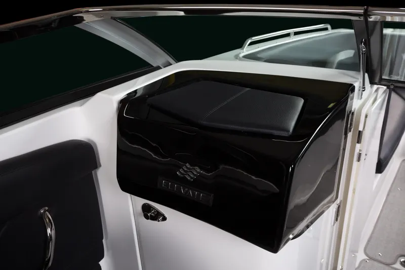 Slide: The Image of 2026 Four Winns HD8 OB boat interior with sleek black and white design. - 11