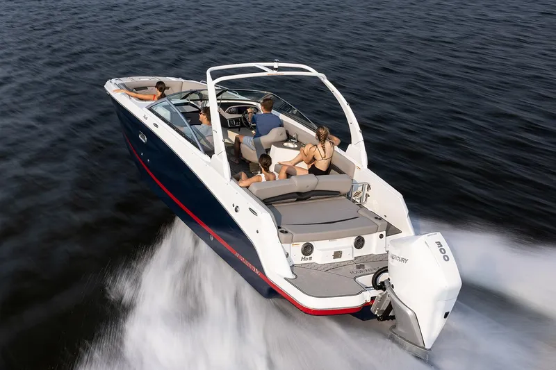 Slide: The Image of Manufacturer Provided Image: 2025 Four Winns HD8 OB boat cruising on open water with passengers onboard. - 2